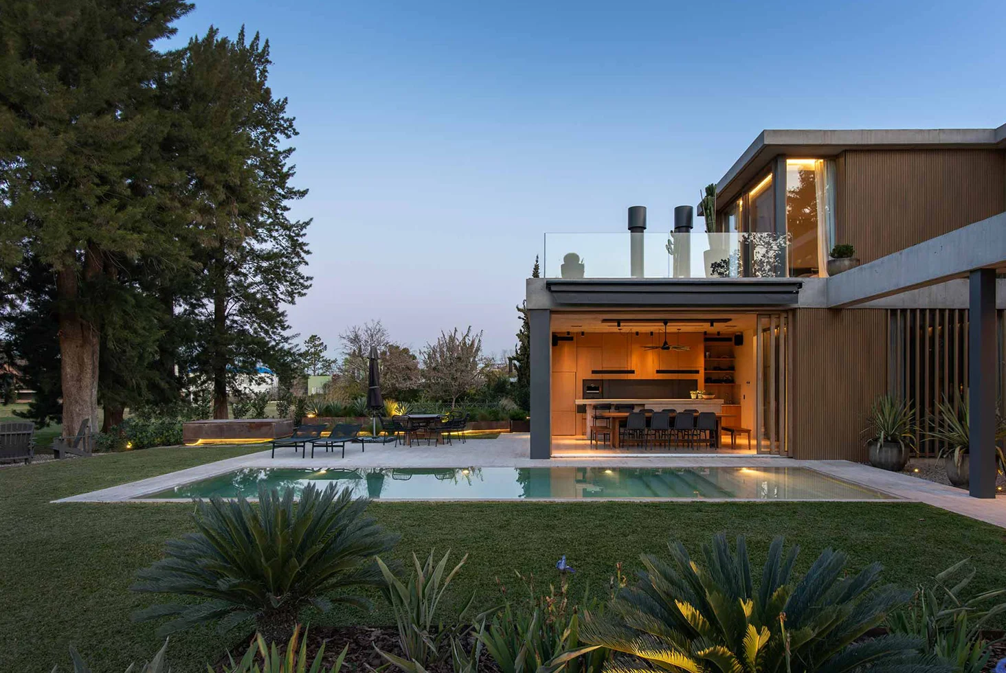 Casa Maui residential outdoor poolside with garden.