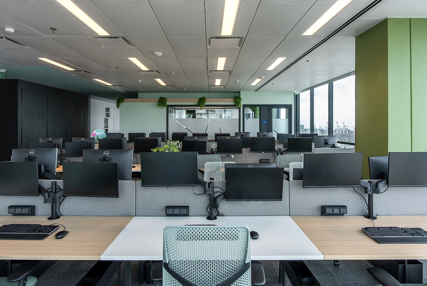 Open workspace with monitors and windows.