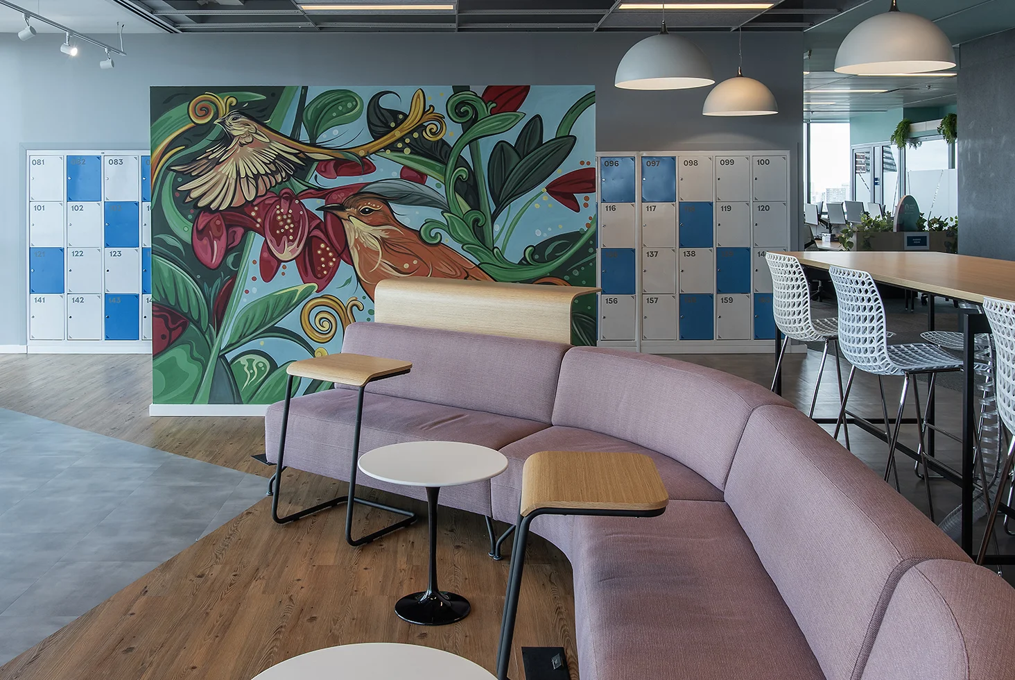 Break area with mural and lockers.